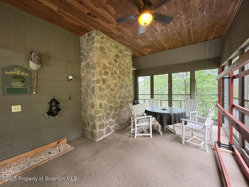498 Penn-York Road Starlight, PA 18461 - Photo 23 of 48 a room with furniture and a large window