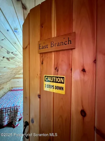 a view of a balcony with chairs