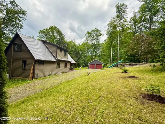 a view of a lake from a yard