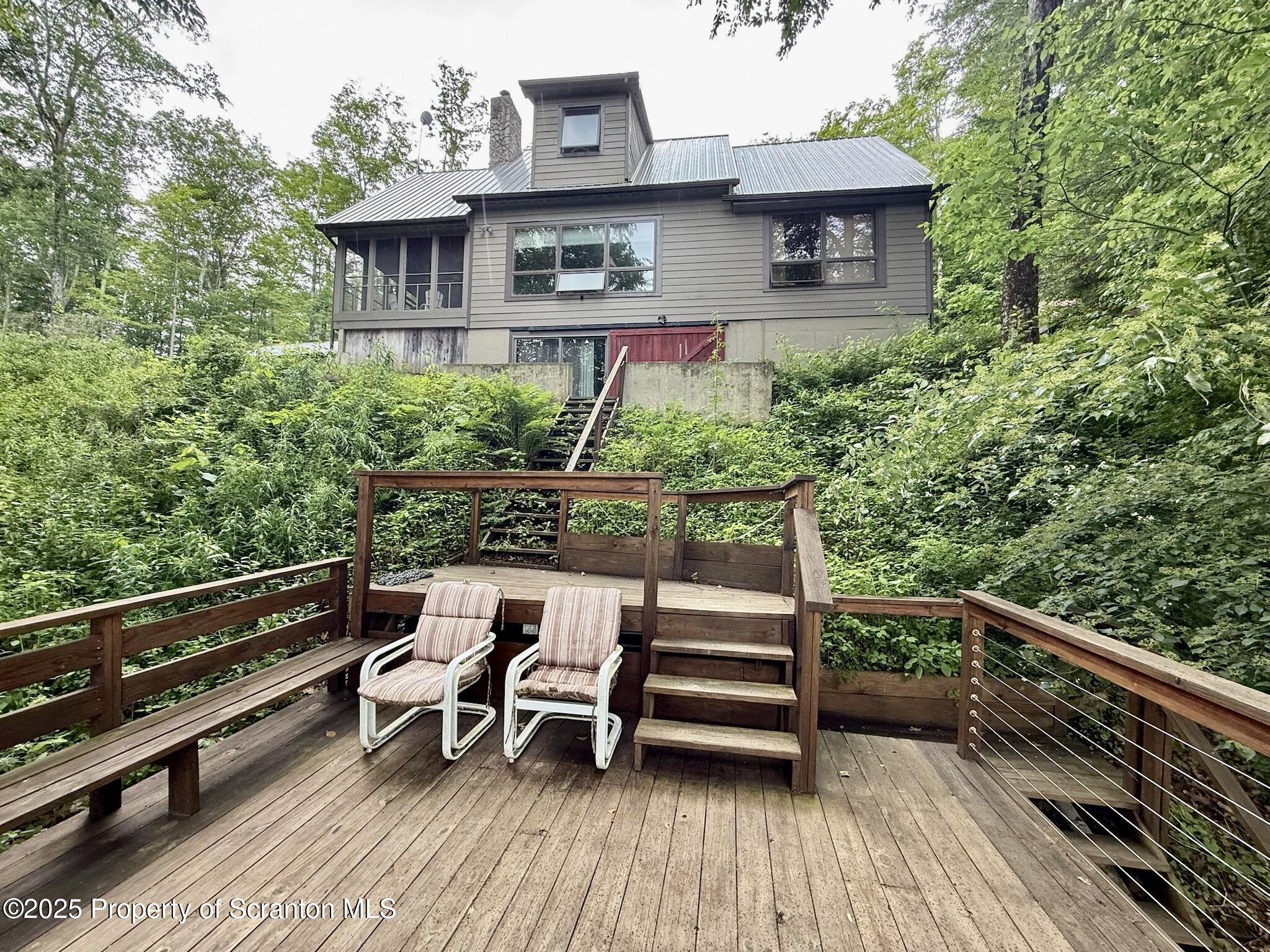 498 Penn-York Road Starlight, PA 18461 - Photo 4 of 48 a view of outdoor space with seating space