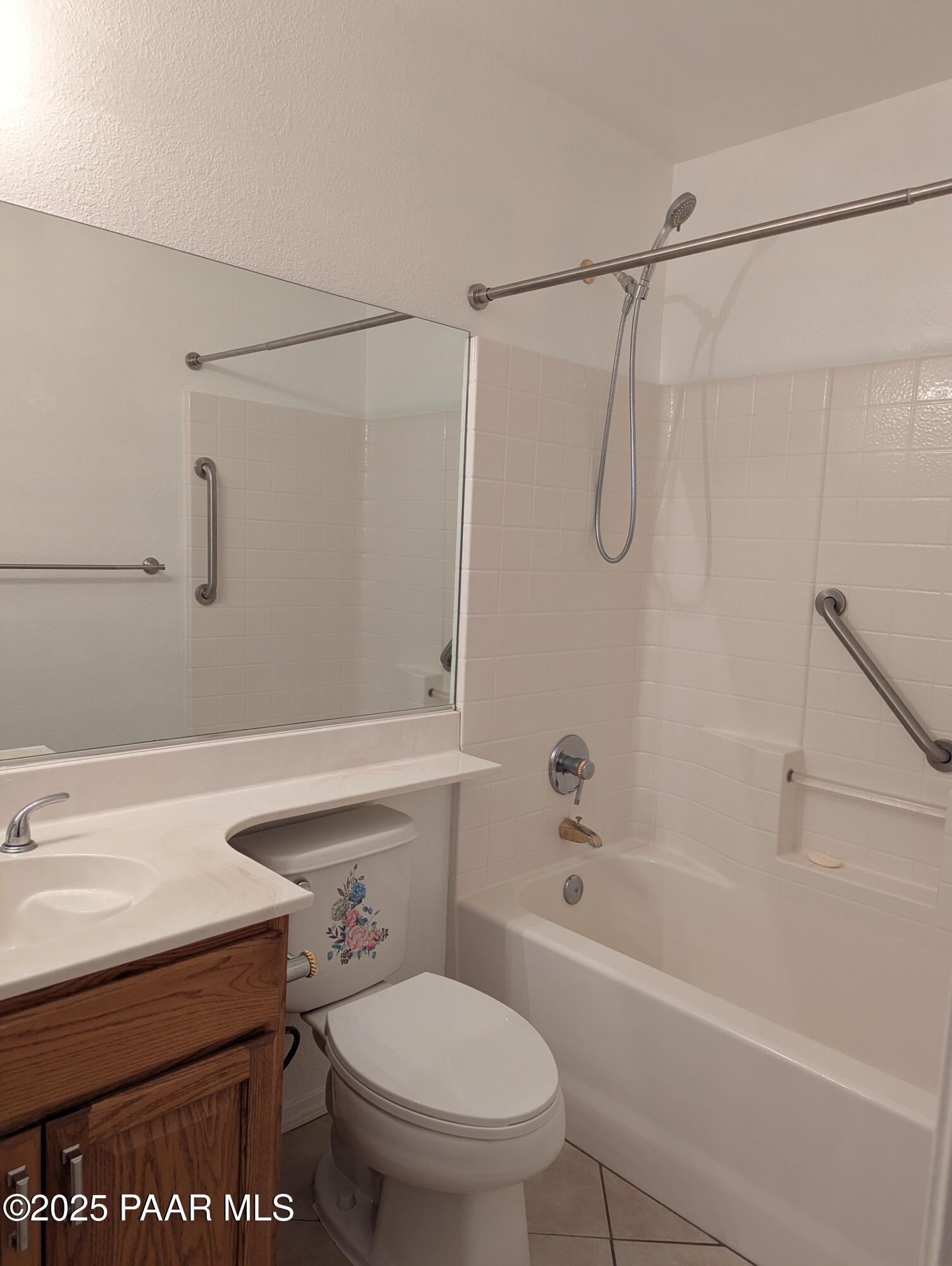 3325 East Yavapai Road, Unit B Prescott Valley, AZ 86314 - Photo 7 of 12 a bathroom with a sink a toilet and a bathtub