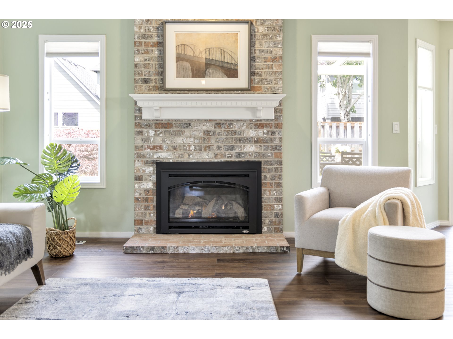 28519 Southwest Cascade Loop Wilsonville, OR 97070 - Photo 12 of 38 a living room with furniture and a fireplace