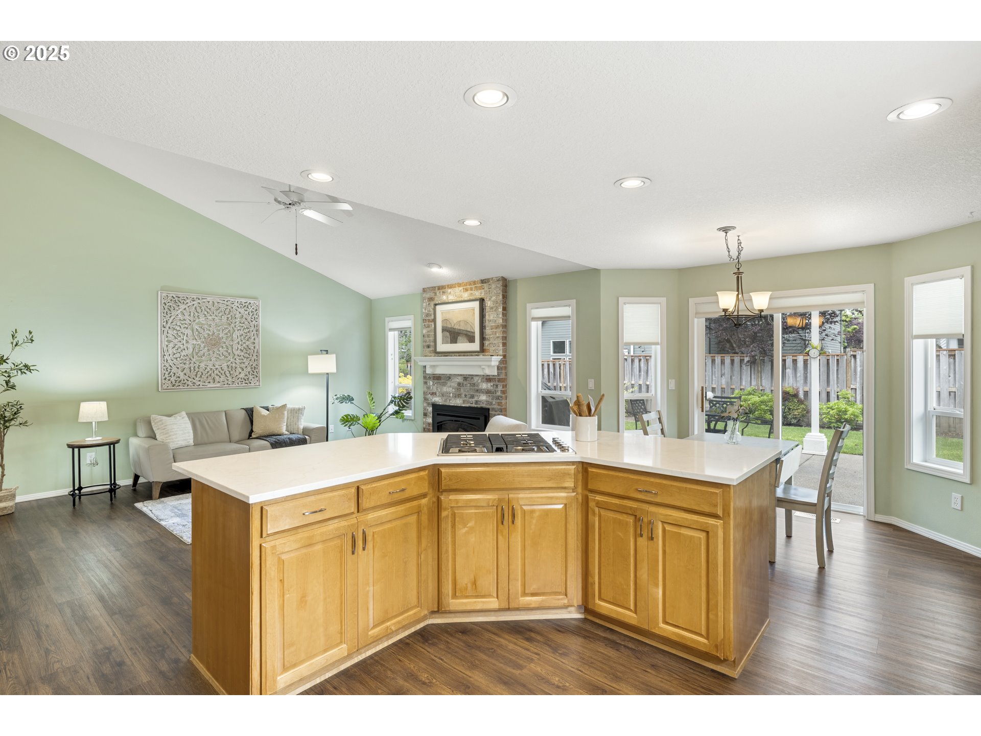 28519 Southwest Cascade Loop Wilsonville, OR 97070 - Photo 17 of 38 a large white kitchen with a large window