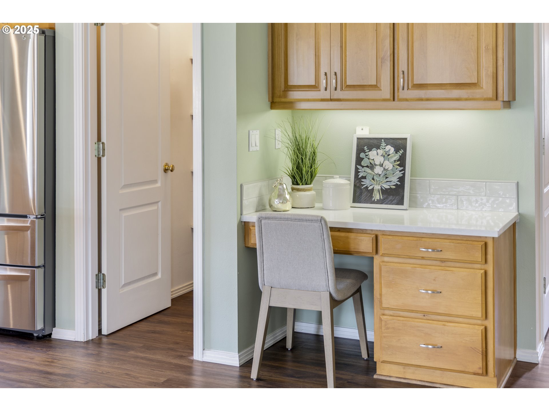 28519 Southwest Cascade Loop Wilsonville, OR 97070 - Photo 21 of 38 a kitchen with stainless steel appliances granite countertop a refrigerator and cabinets