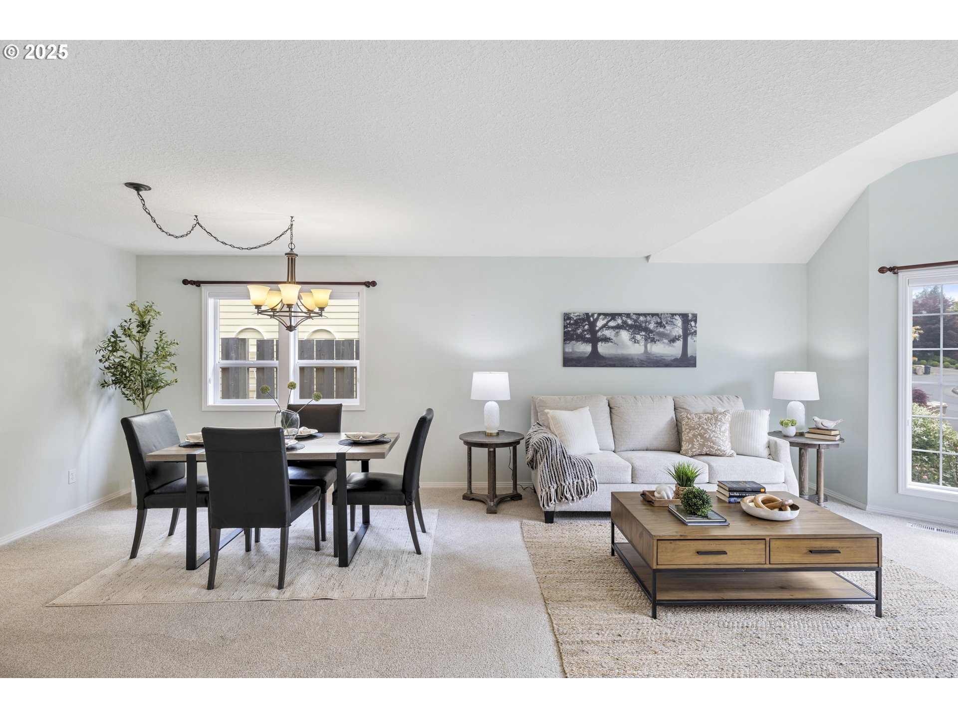 28519 Southwest Cascade Loop Wilsonville, OR 97070 - Photo 6 of 38 a living room with furniture and a dining table