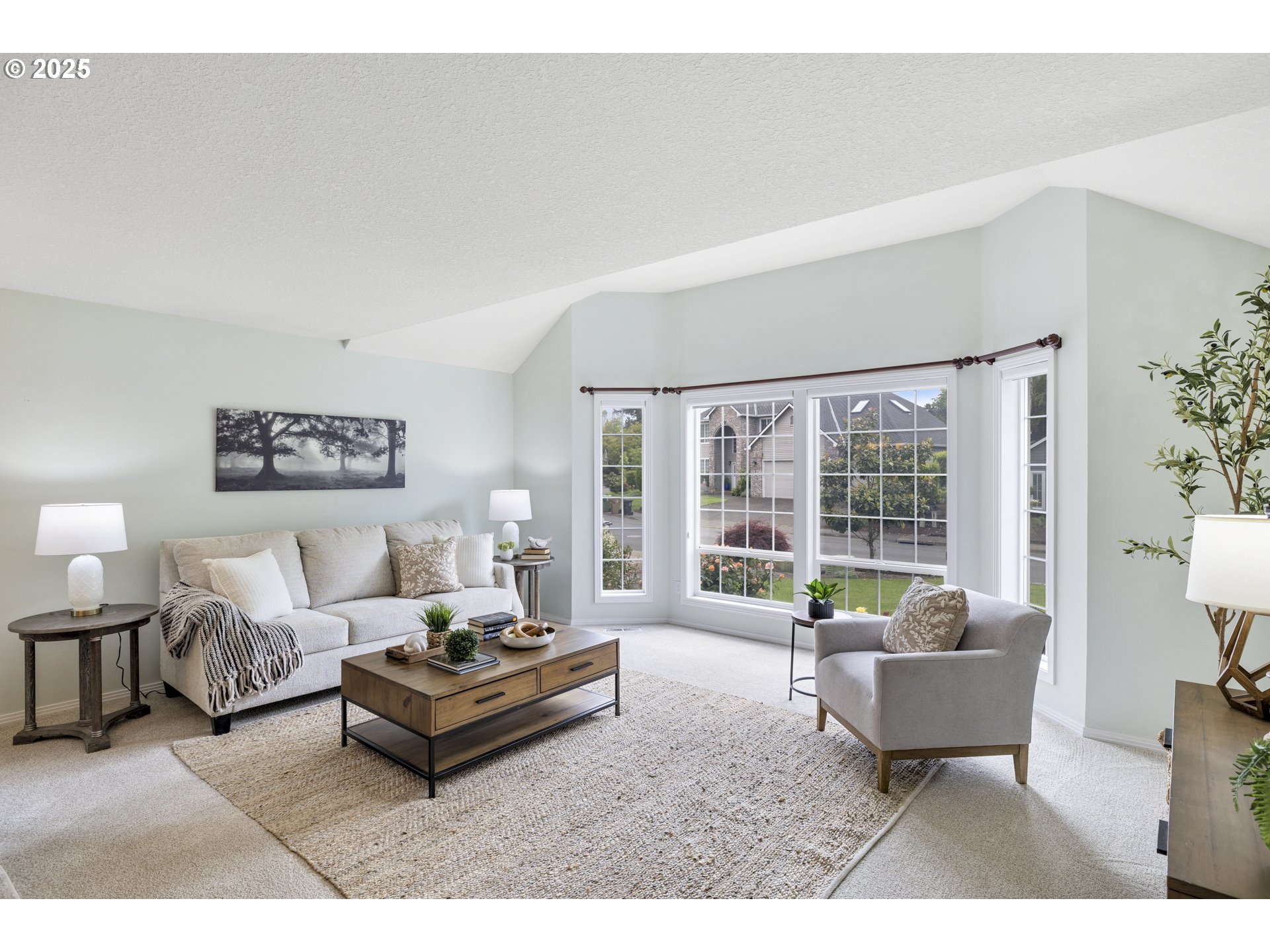 28519 Southwest Cascade Loop Wilsonville, OR 97070 - Photo 7 of 38 a living room with furniture and a large window