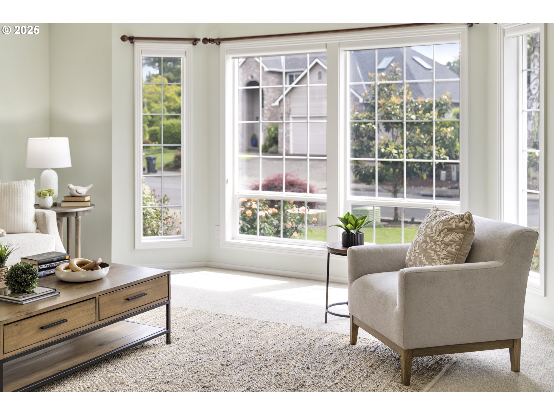 28519 Southwest Cascade Loop Wilsonville, OR 97070 - Photo 8 of 38 a living room with furniture and a large window