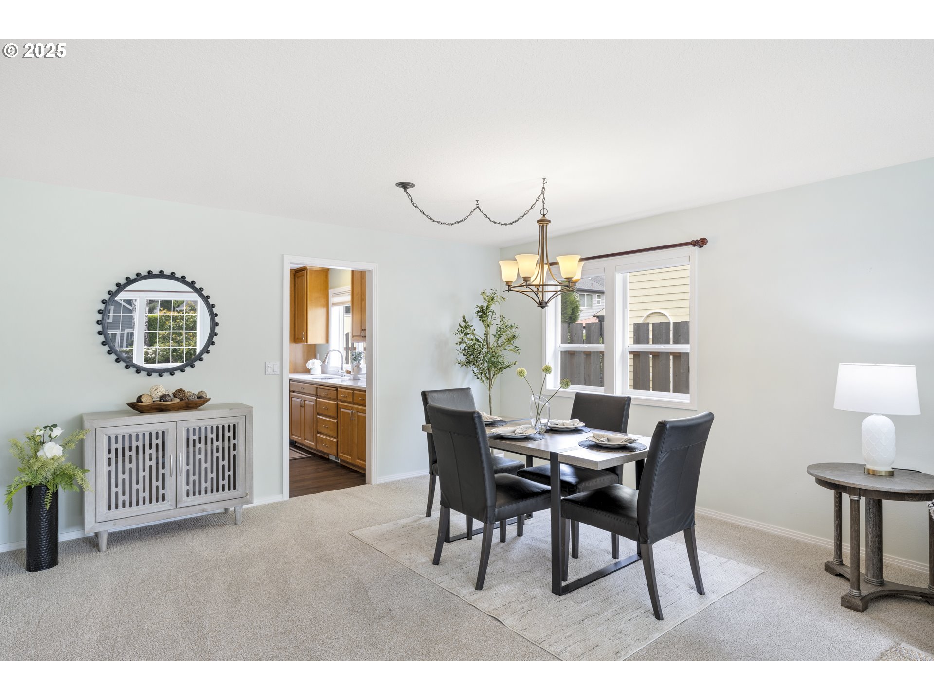 28519 Southwest Cascade Loop Wilsonville, OR 97070 - Photo 10 of 38 a view of a dining room with furniture