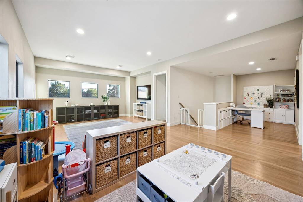 4419 Merrell Road Dallas, TX 75229 - Photo 24 of 27 a living room with furniture and wooden floor