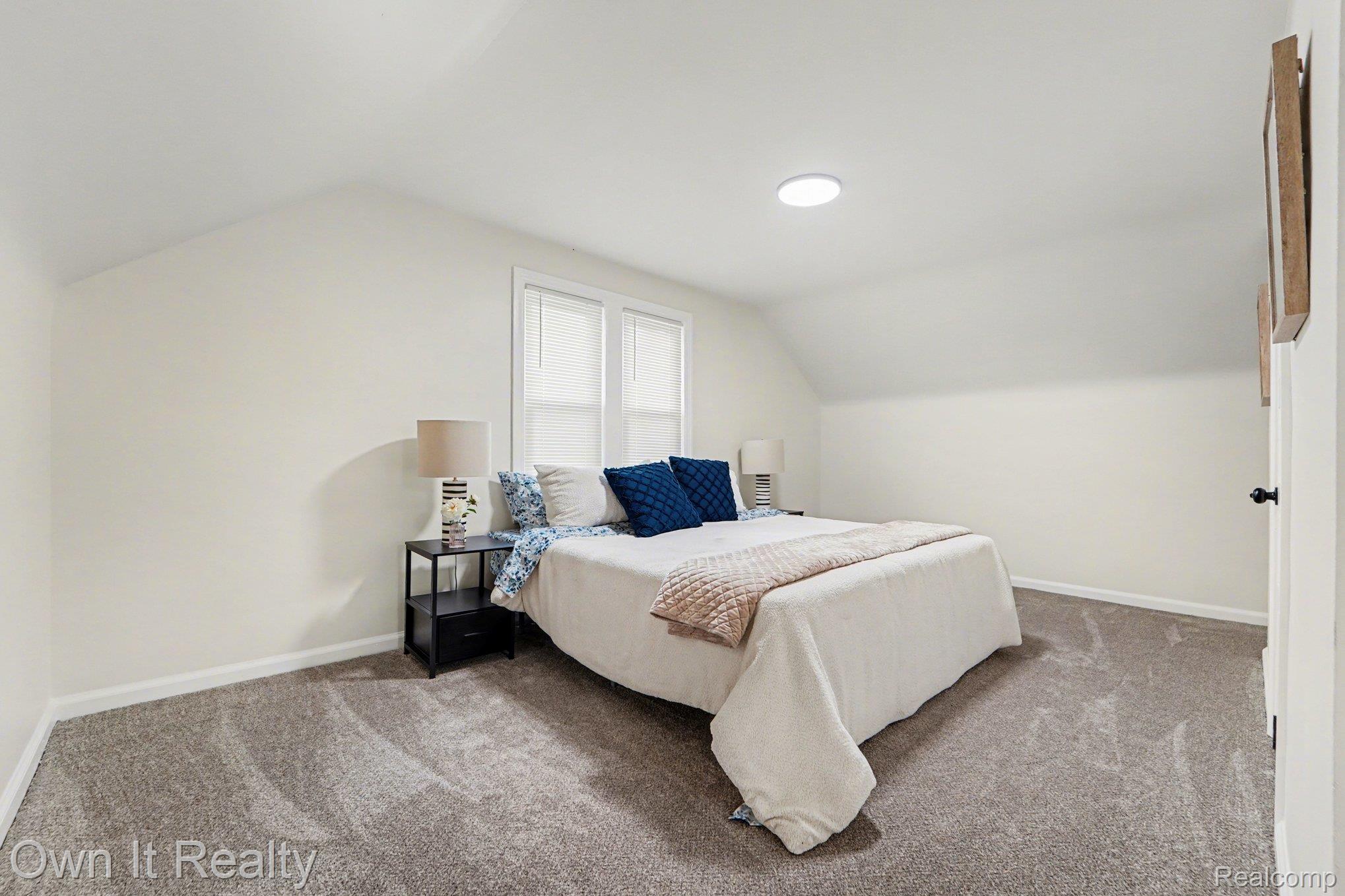 168 Kerby Road Grosse Pointe, MI 48236 - Photo 16 of 36 Bedroom featuring lofted ceiling and carpet