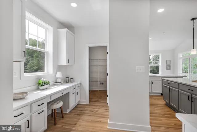 a bedroom with a large bed and a couch