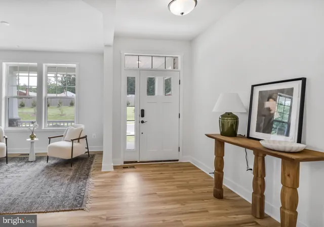 a view of a living room and dining room