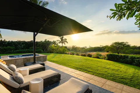 a view of swimming pool with a back yard