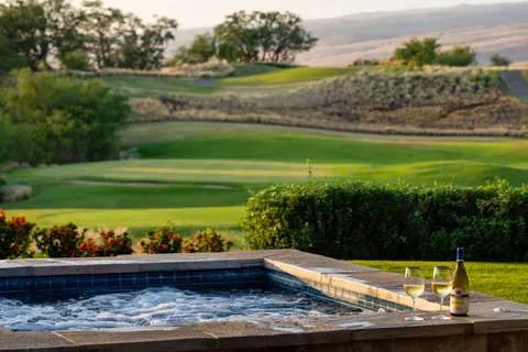 a view of swimming pool with a yard
