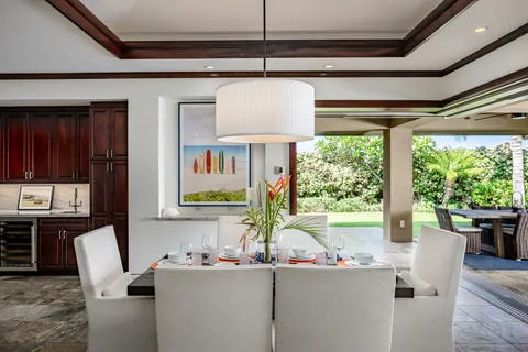 a kitchen with a sink and a large window