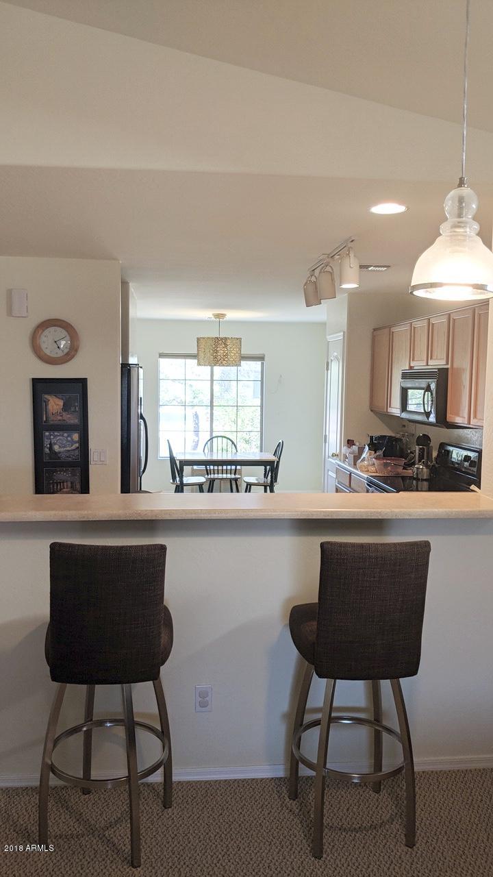 17773 West Calavar Road Surprise, AZ 85388 - Photo 4 of 15 Breakfast Bar Kitchen