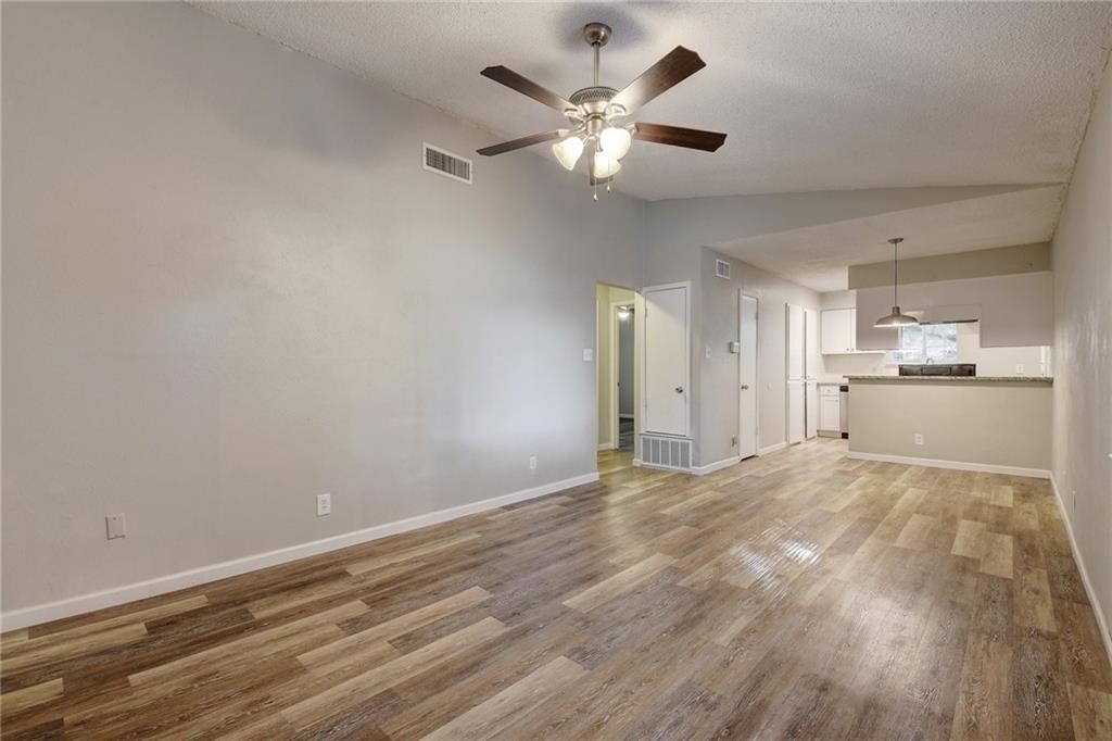2311 Teri Road, Unit B Austin, TX 78744 - Photo 3 of 25 a view of an empty room with a window