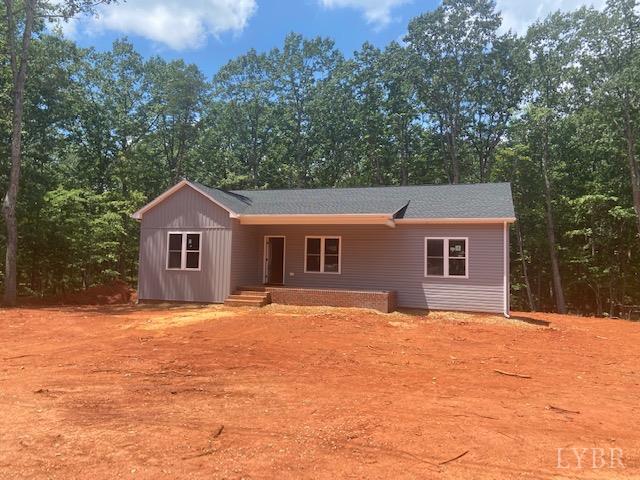 2501 Stonewall Road Concord, VA 24538 - Photo 2 of 8 a front view of a house with yard covered with trees