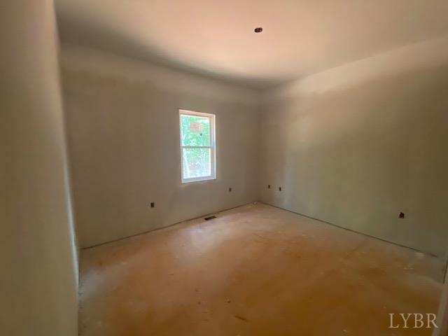 2501 Stonewall Road Concord, VA 24538 - Photo 8 of 8 a view of an empty room with a window