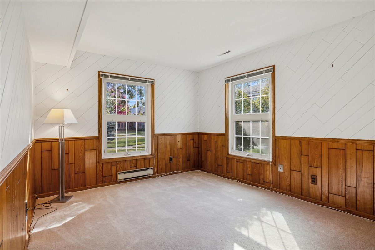 511 Coventry Lane, Unit 2 Crystal Lake, IL 60014 - Photo 15 of 40 a view of an empty room with a window