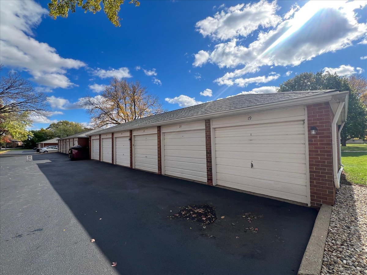 511 Coventry Lane, Unit 2 Crystal Lake, IL 60014 - Photo 22 of 40 a view of a house with a yard