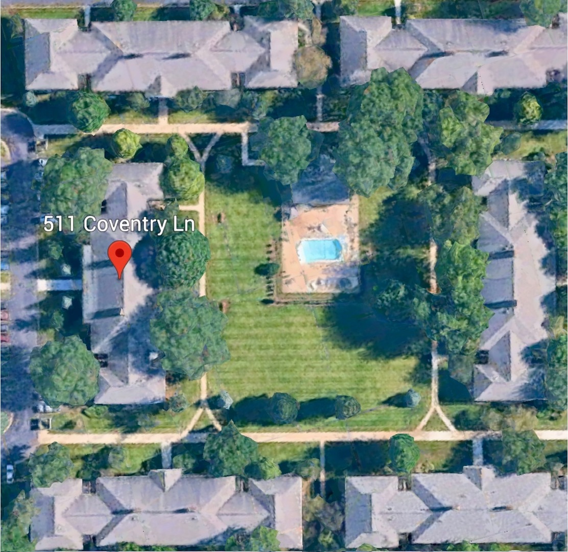 511 Coventry Lane, Unit 2 Crystal Lake, IL 60014 - Photo 29 of 40 an aerial view of residential houses with outdoor space and swimming pool