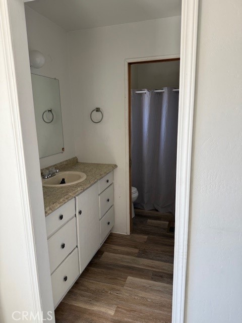 140 Crable Street Frazier Park, CA 93225 - Photo 14 of 16 a bathroom with a granite countertop sink and a mirror