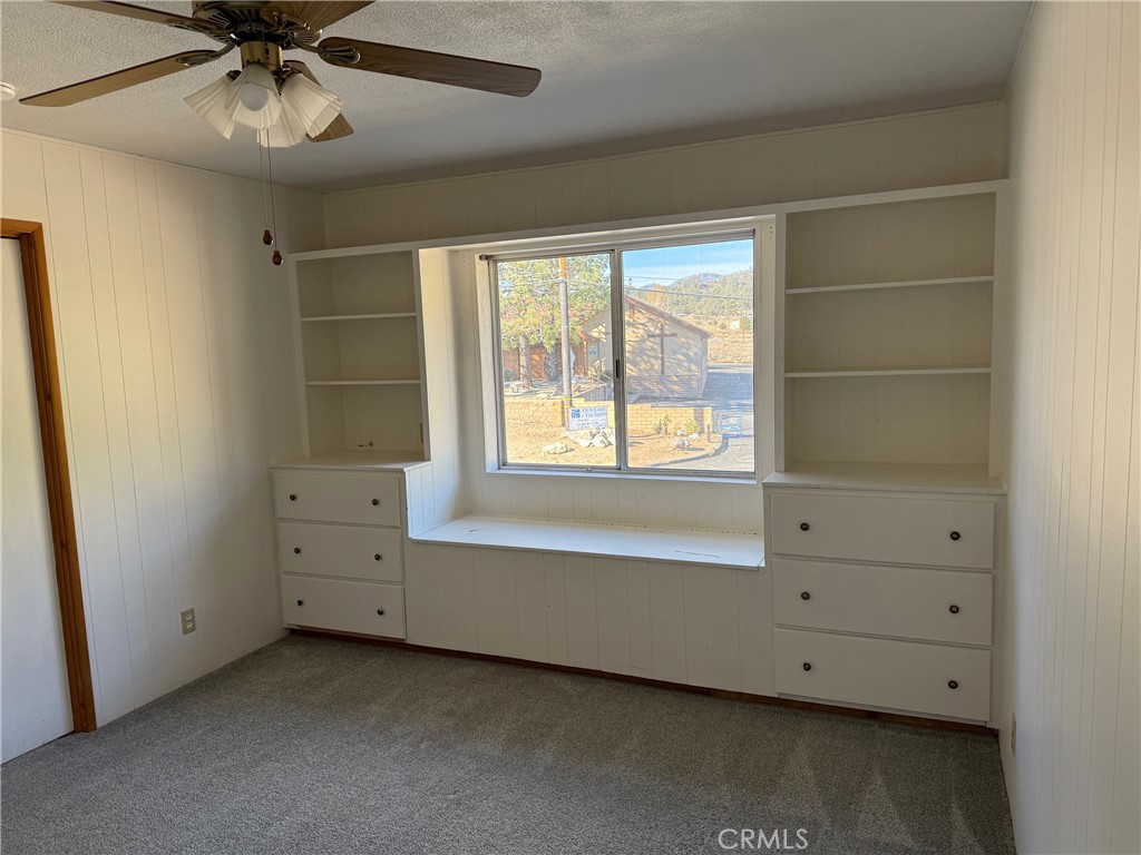 140 Crable Street Frazier Park, CA 93225 - Photo 15 of 16 a view of an empty room with a window