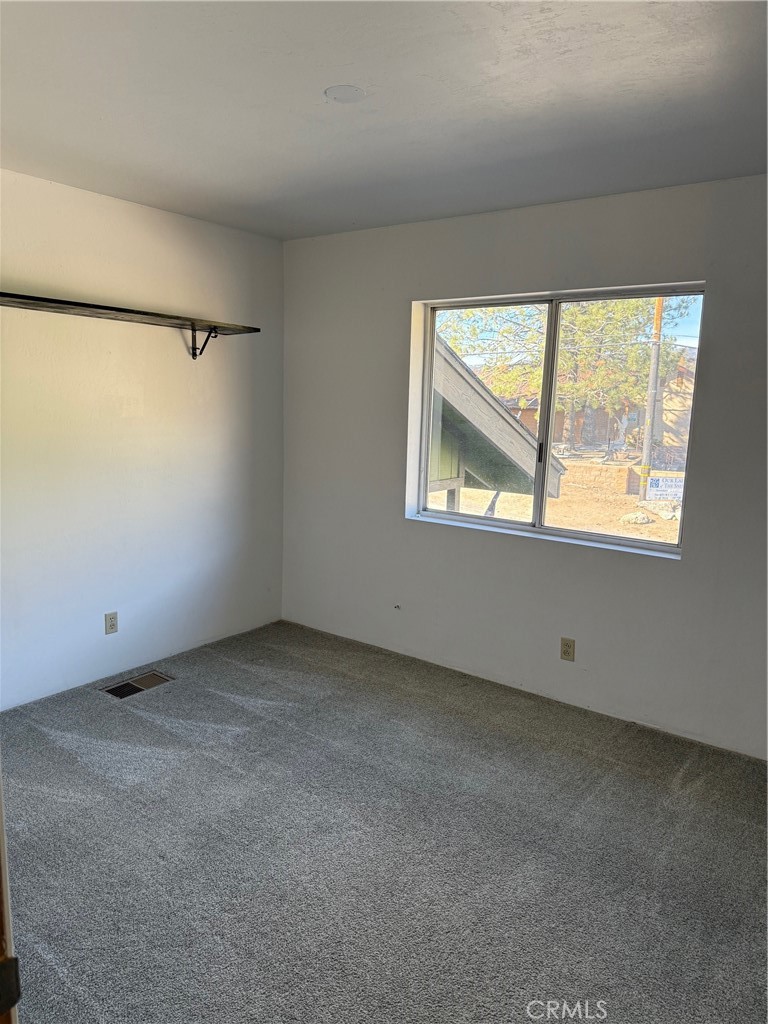 140 Crable Street Frazier Park, CA 93225 - Photo 16 of 16 an empty room with a window