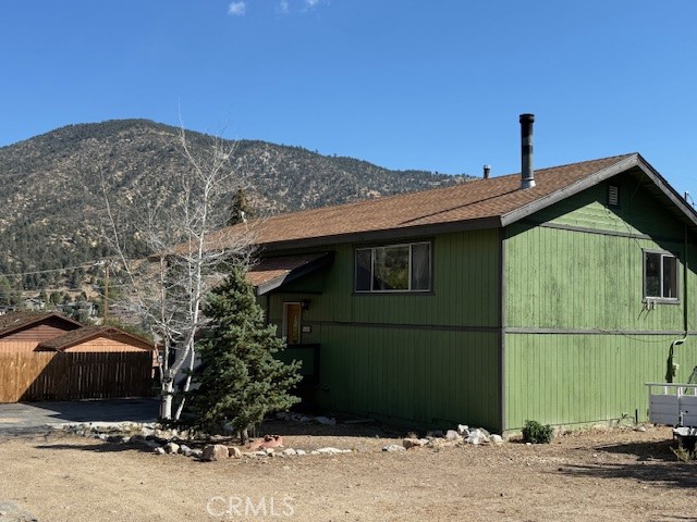 140 Crable Street Frazier Park, CA 93225 - Photo 4 of 16 a front view of a house with a yard
