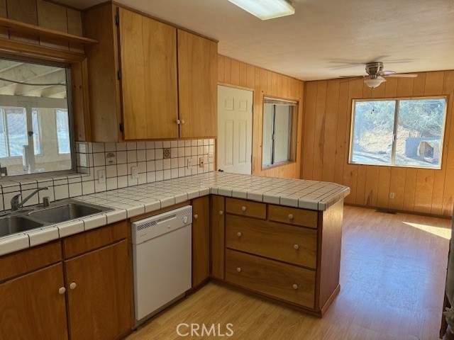 140 Crable Street Frazier Park, CA 93225 - Photo 7 of 16 a kitchen with a sink and cabinets