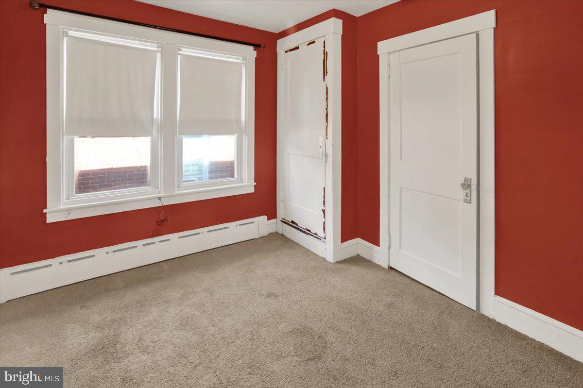 29 Arlington Street Reading, PA 19611 - Photo 22 of 32 a view of an empty room with a window