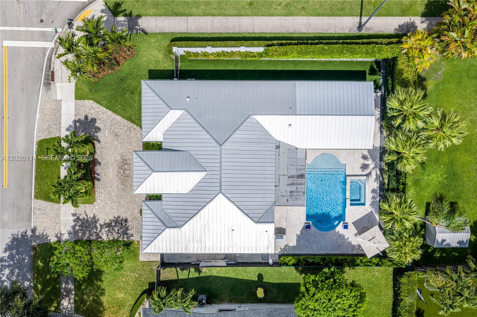9641 Southwest 66th Street Miami, FL 33173 - Photo 56 of 57 a aerial view of a house with a yard and plants