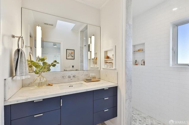 a two chairs sitting in the middle of a yard