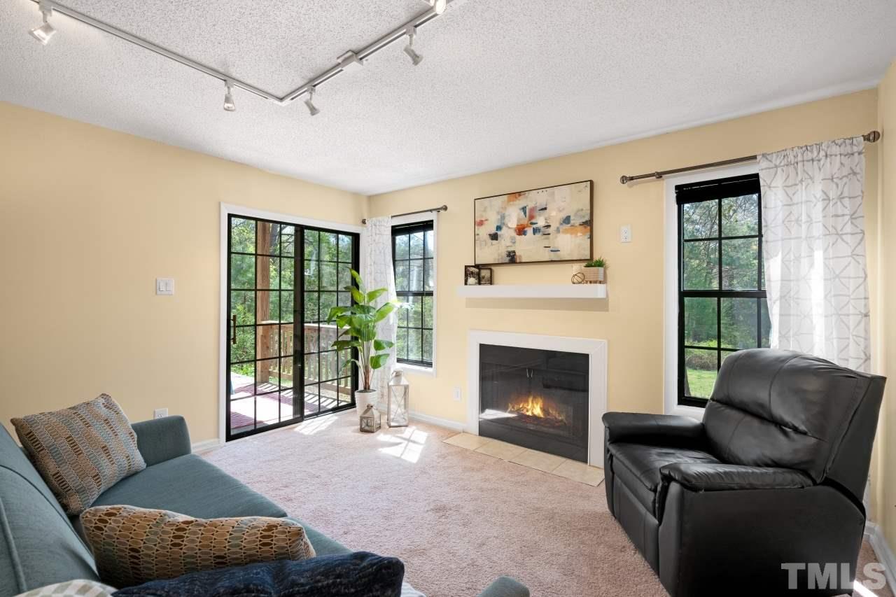 3706 Chimney Ridge Place, Unit 4 Durham, NC 27713 - Photo 11 of 29 a living room with furniture and a fireplace