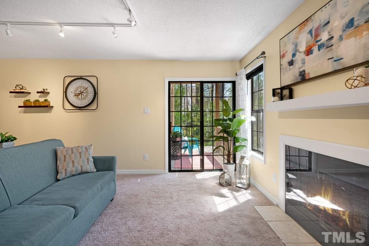 3706 Chimney Ridge Place, Unit 4 Durham, NC 27713 - Photo 12 of 29 a living room with furniture and a large window