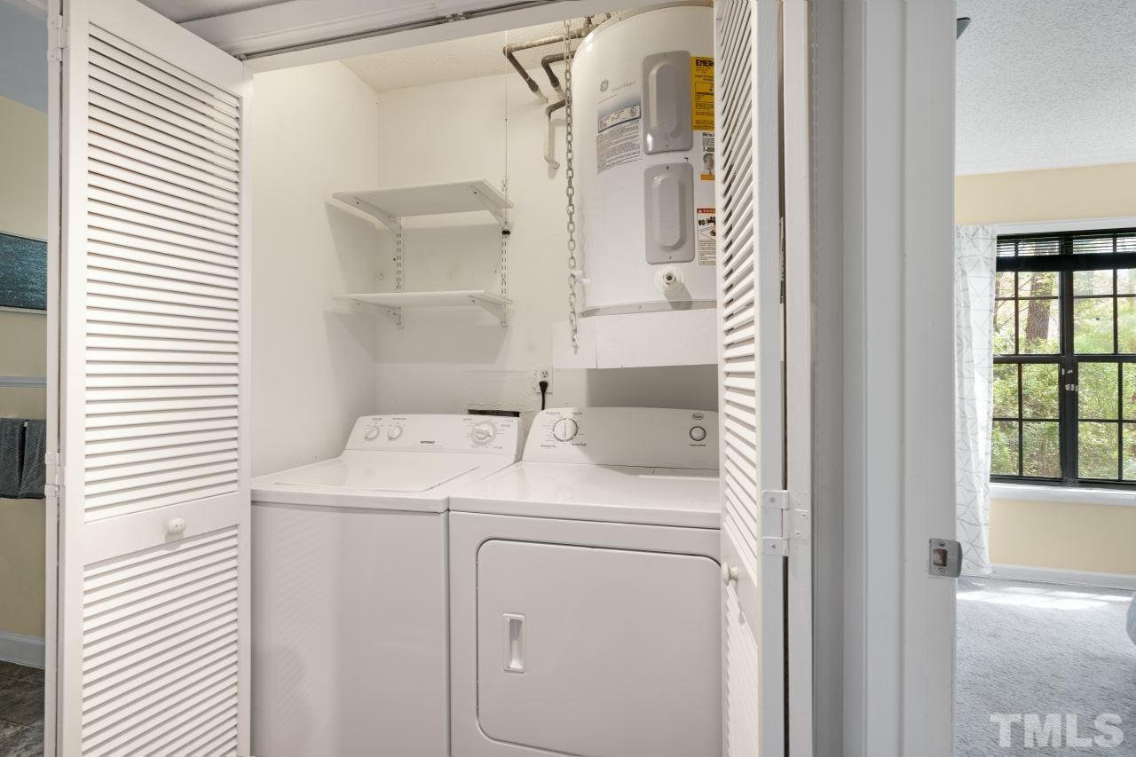 3706 Chimney Ridge Place, Unit 4 Durham, NC 27713 - Photo 21 of 29 a utility room with dryer and washer