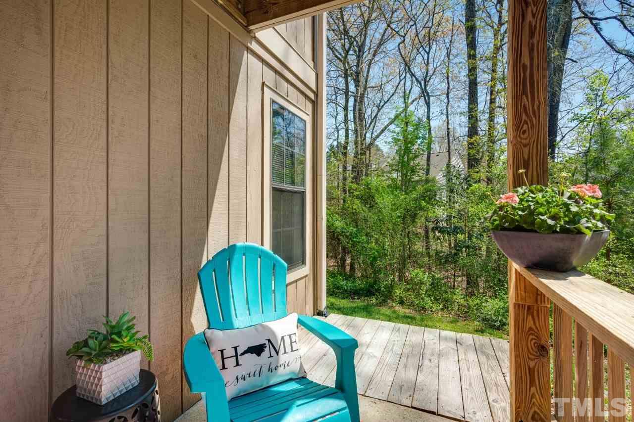 3706 Chimney Ridge Place, Unit 4 Durham, NC 27713 - Photo 22 of 29 a view of a porch with furniture and garden