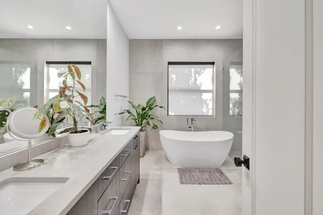 a view of a livingroom with furniture and a window