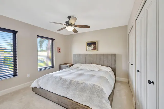 a view of a house with a yard and plants