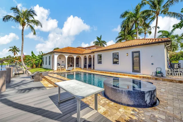 a view of a brick building with a yard