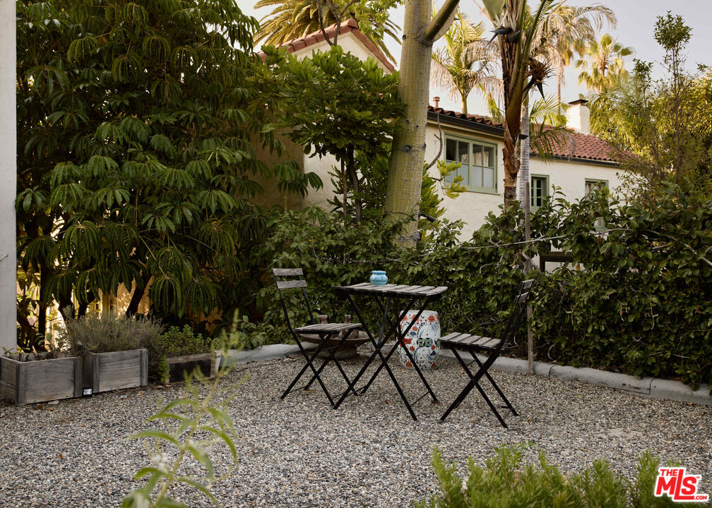 2034 Grace Avenue Los Angeles, CA 90068 - Photo 1 of 1 a view of a chairs and table in backyard