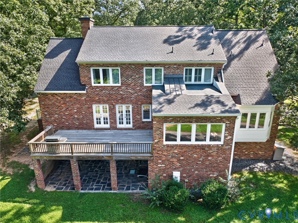1108 Shallow Well Road Manakin-Sabot, VA 23103 - Photo 7 of 8 Brick exterior with multiple windows, a wood deck,