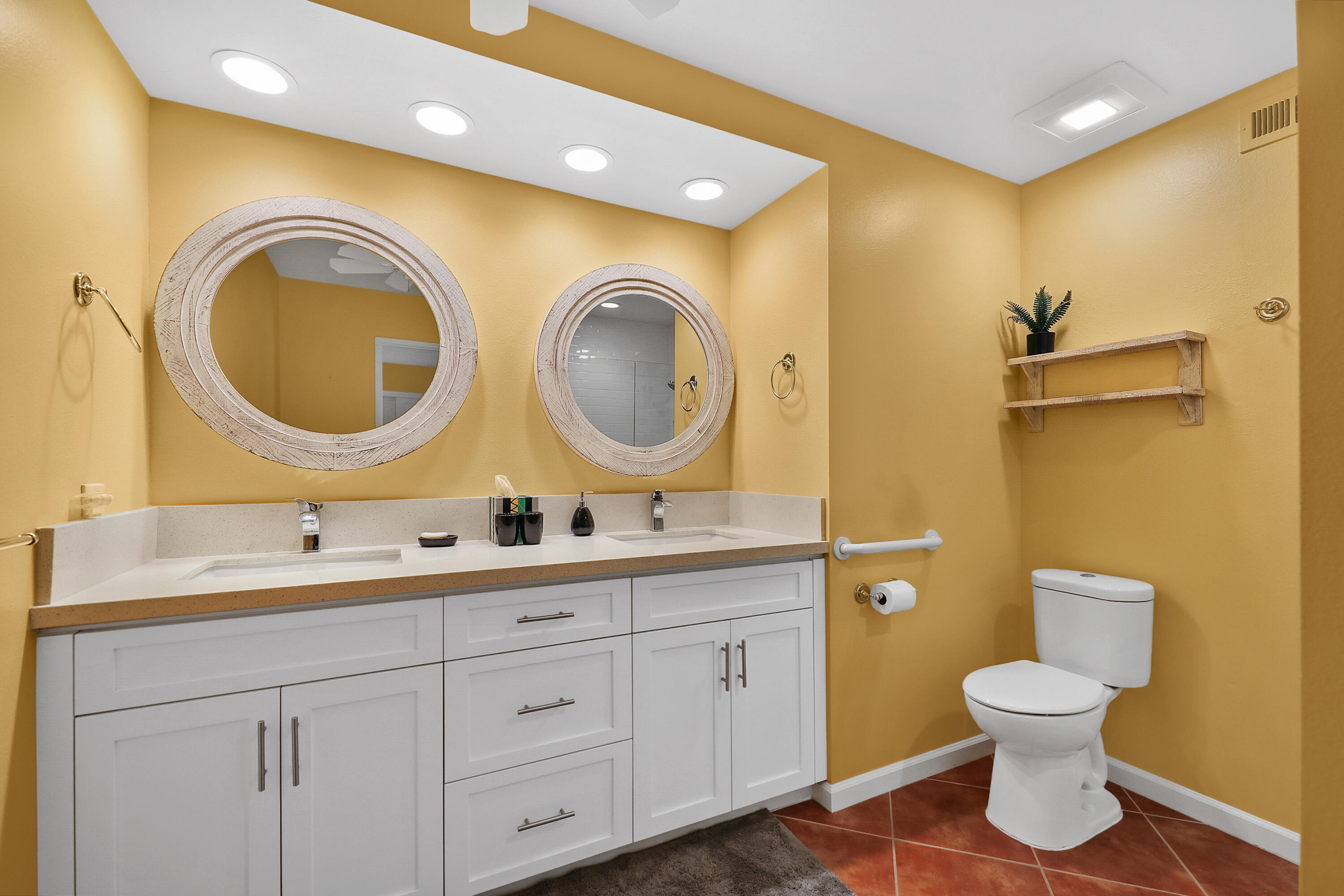 23 La Ronda Drive Rancho Mirage, CA 92270 - Photo 19 of 34 a bathroom with a toilet sink and mirror