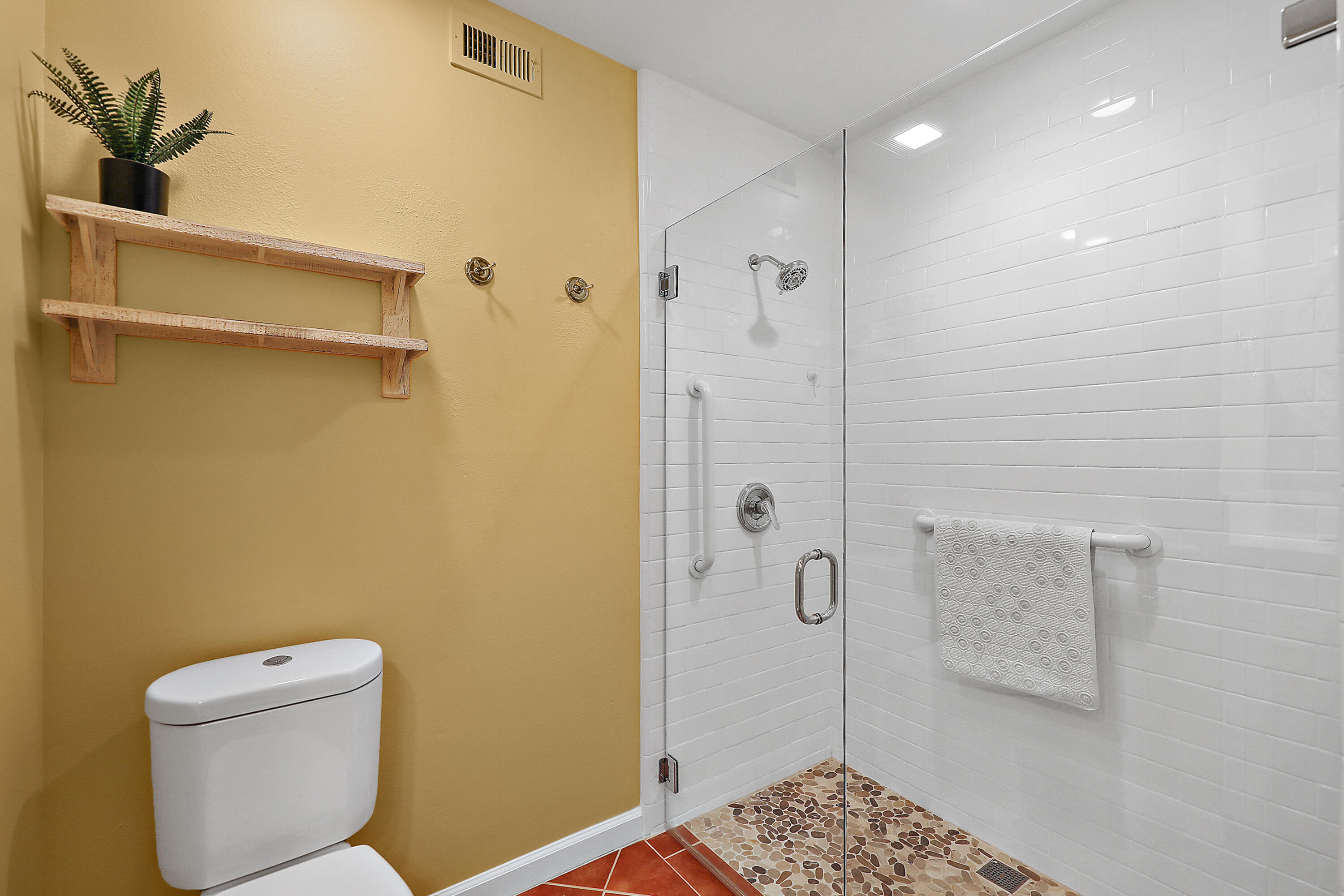 23 La Ronda Drive Rancho Mirage, CA 92270 - Photo 20 of 34 a bathroom with a toilet and a shower