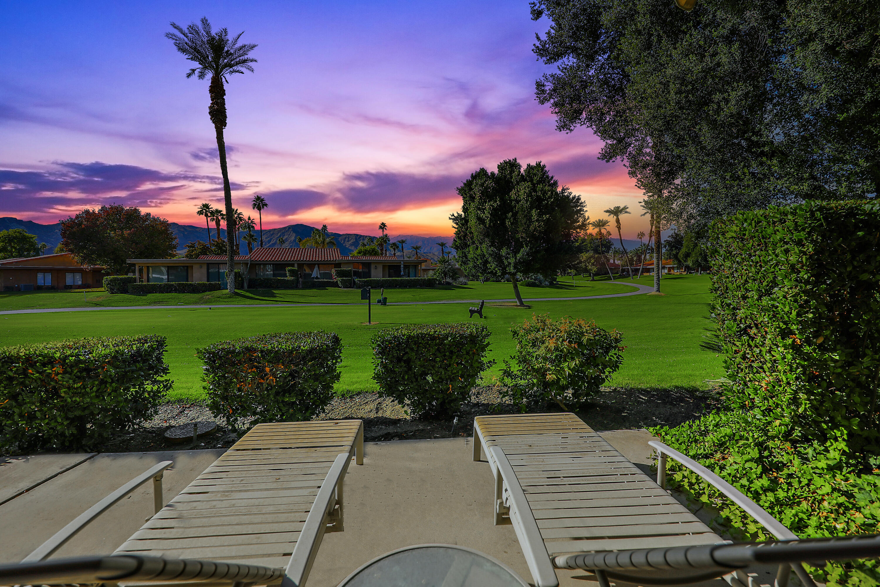 23 La Ronda Drive Rancho Mirage, CA 92270 - Photo 23 of 34 a view of a patio with a yard