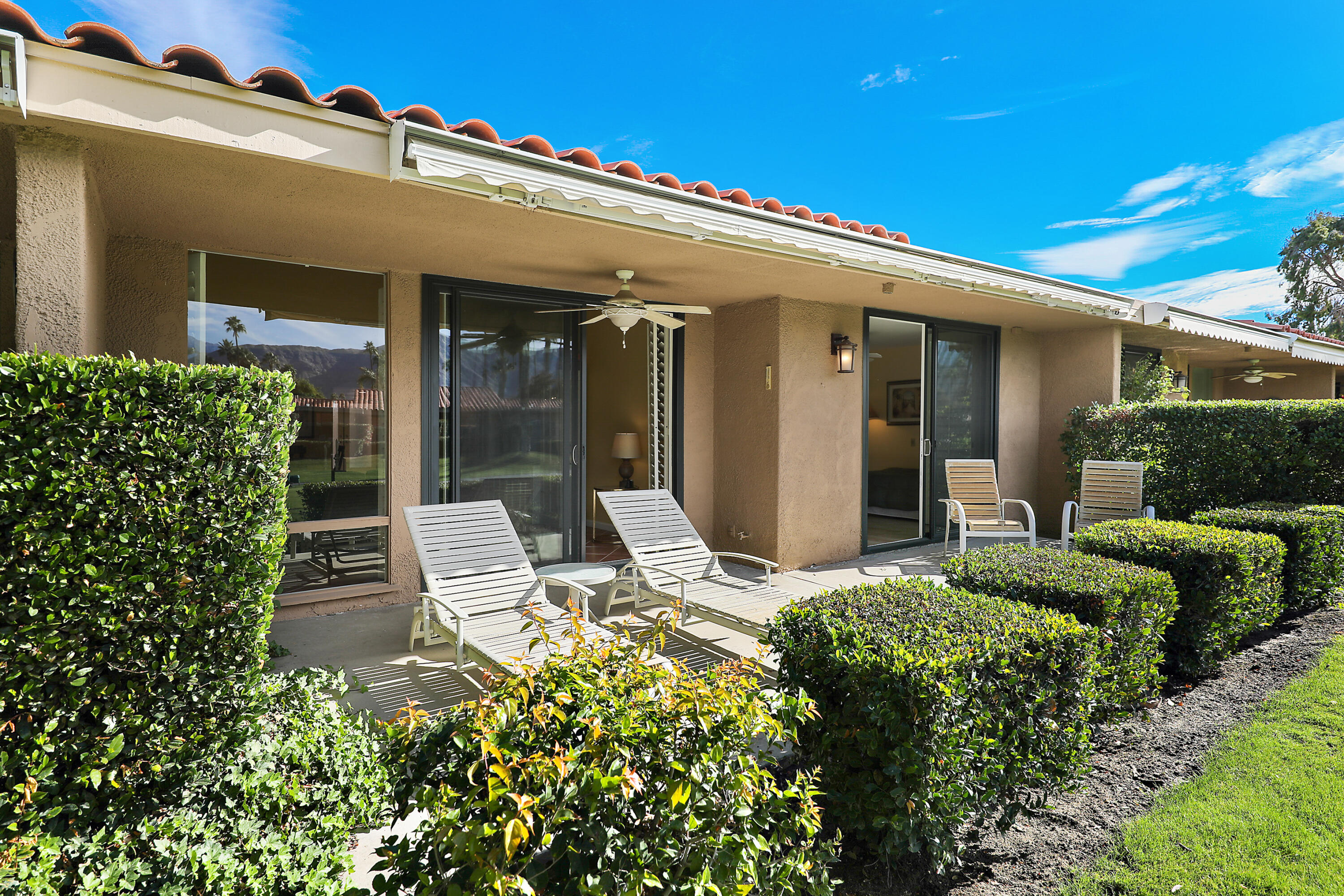 23 La Ronda Drive Rancho Mirage, CA 92270 - Photo 26 of 34 front view of a house with a large windows