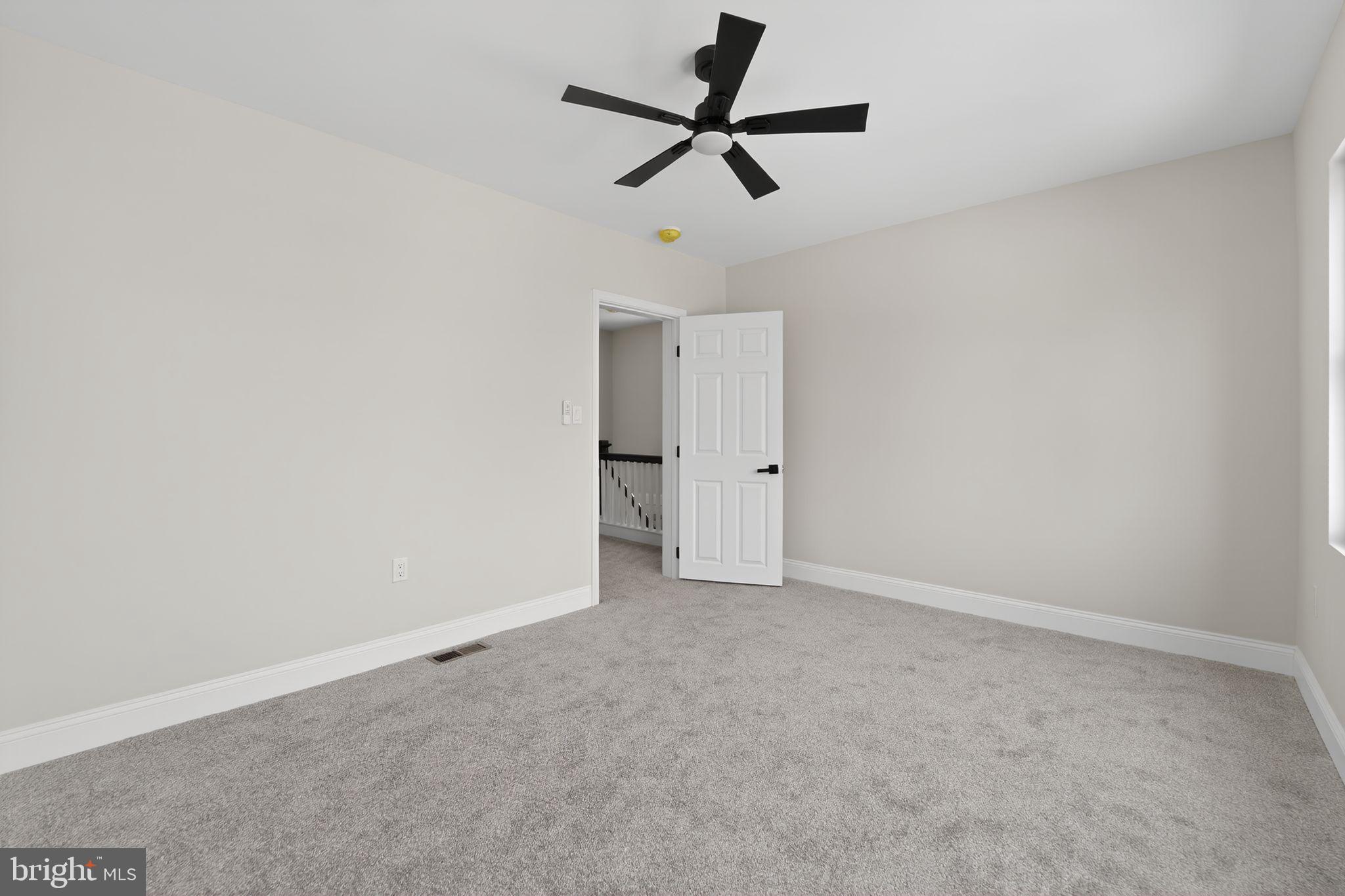 2911 Pinewood Avenue Baltimore, MD 21214 - Photo 20 of 30 a view of empty room with ceiling fan
