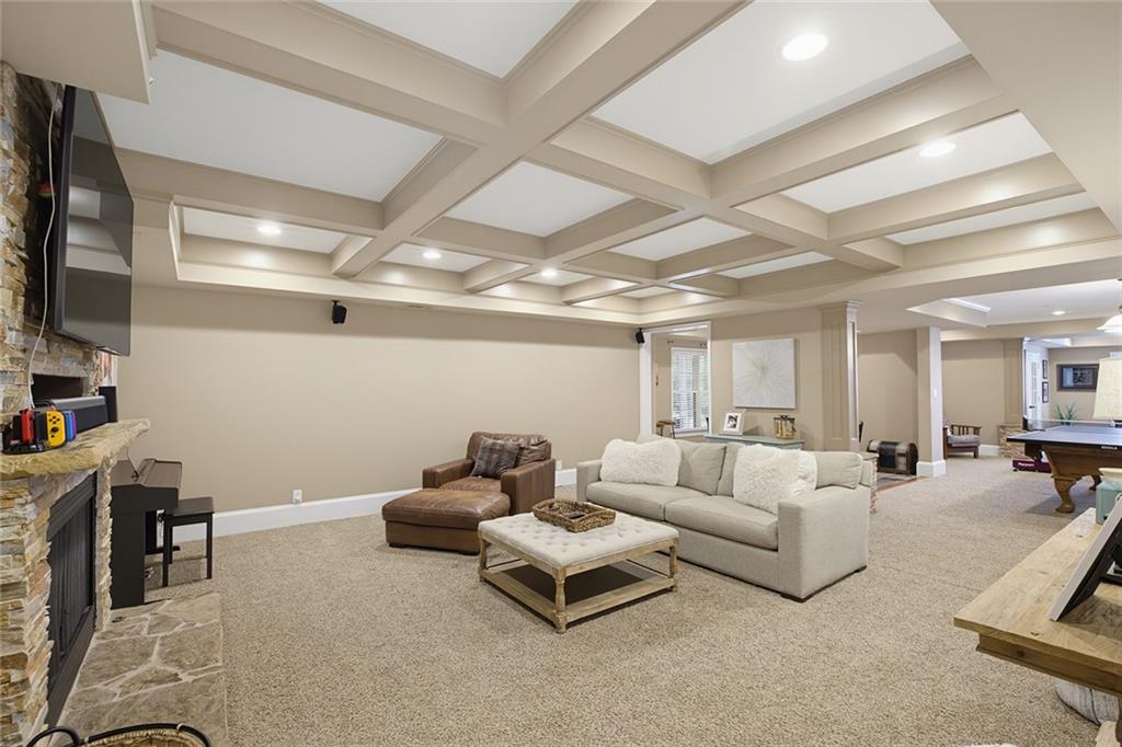 14442 Club Circle Milton, GA 30004 - Photo 45 of 82 a living room with furniture and a flat screen tv