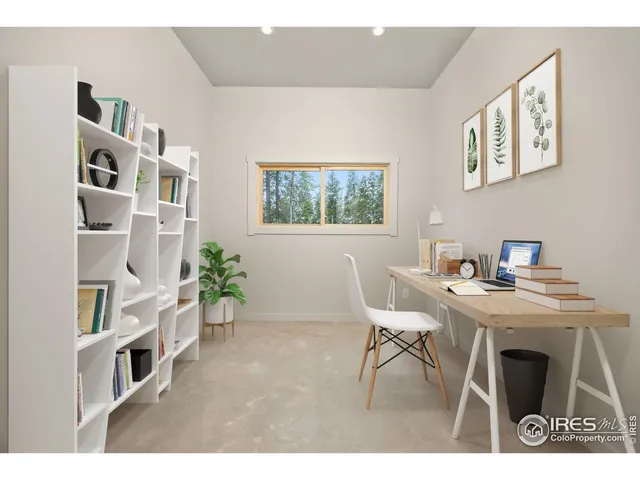 a view of a dining room with furniture and a potted plant